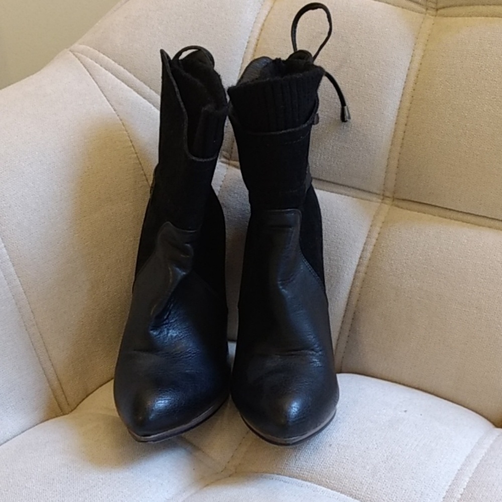 Black high heeled bootie.